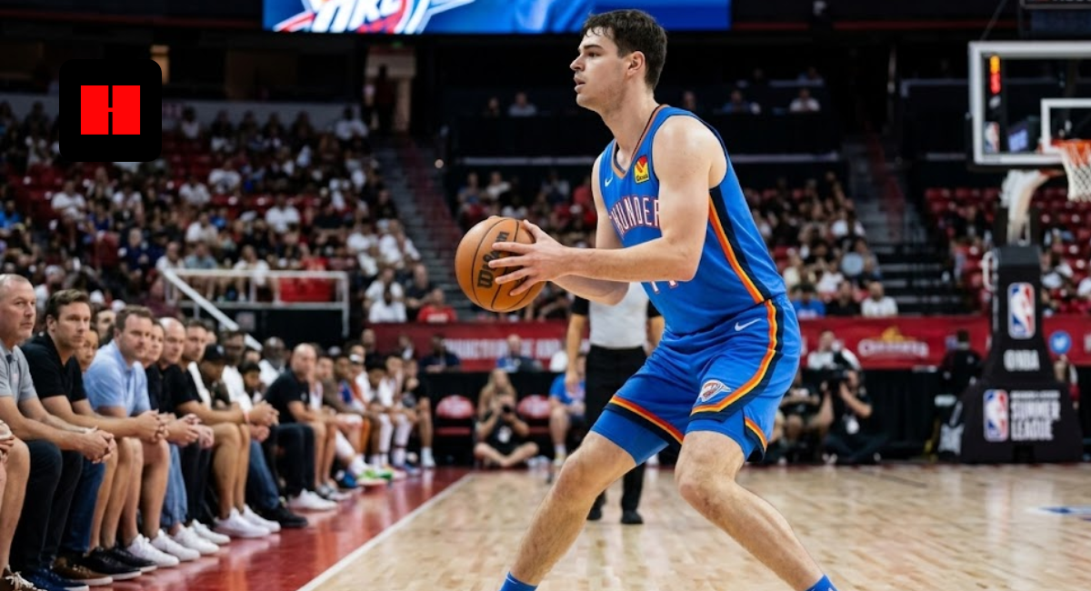 Oklahoma City Thunder guard Nikola Topić holding a basketball in a triple-threat stance during an NBA Summer League game.