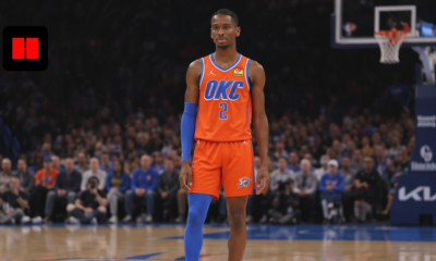 Oklahoma City Thunder basketball player standing on court during NBA game with arena background and new camera angle view