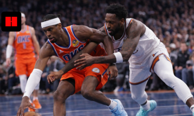 Shai Gilgeous-Alexander driving past a defender in an intense OKC vs Knicks NBA game action shot