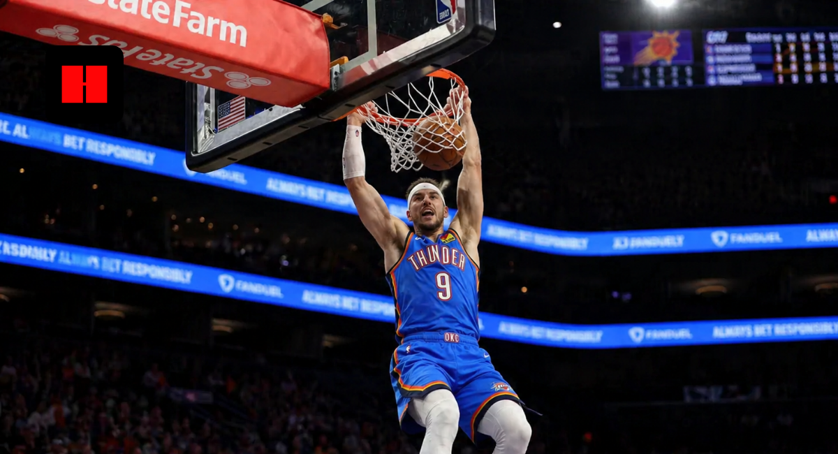 Alex Caruso of the Oklahoma City Thunder throws down a two-handed dunk against the Phoenix Suns during the 2026 NBA Playoffs game in Phoenix