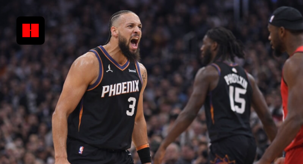 Phoenix Suns player wearing jersey number 3 shouting during an intense NBA game moment on the court