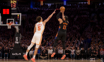 Jalen Brunson of the New York Knicks shoots a contested jump shot over Daniels during an NBA game at Madison Square Garden in 2026