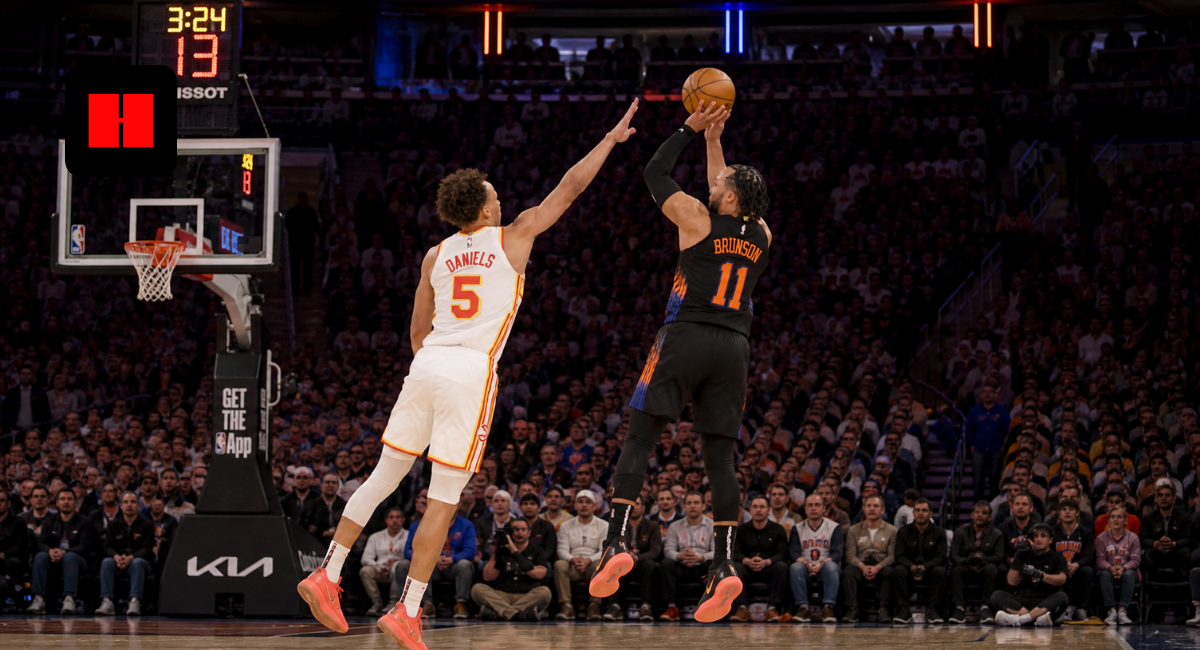Jalen Brunson of the New York Knicks shoots a contested jump shot over Daniels during an NBA game at Madison Square Garden in 2026