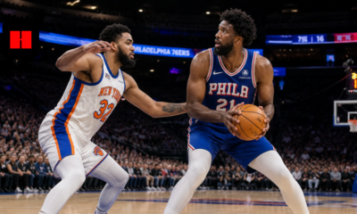 Joel Embiid of the Philadelphia 76ers backing down Karl-Anthony Towns of the New York Knicks during an NBA game action shot
